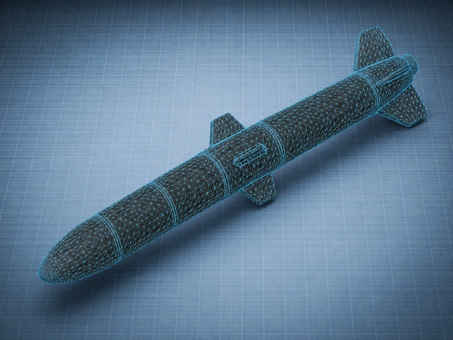 Digital wireframe model of a rocket against a grid background.