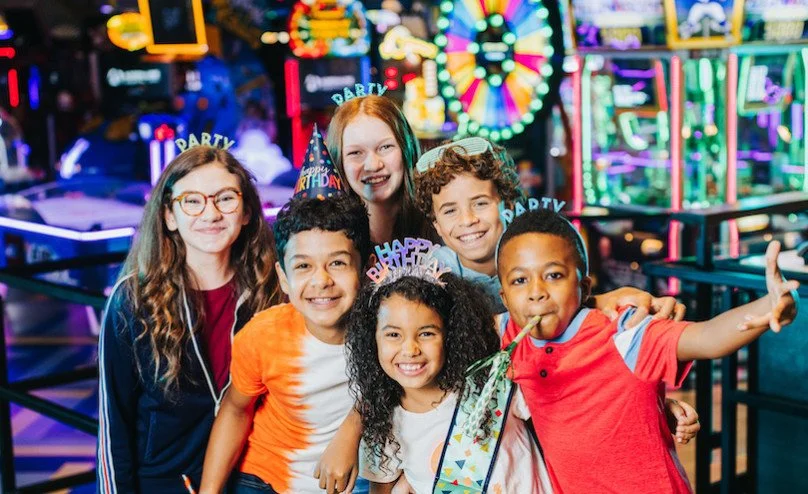 Kids celebrating a birthday in our fun arcade.