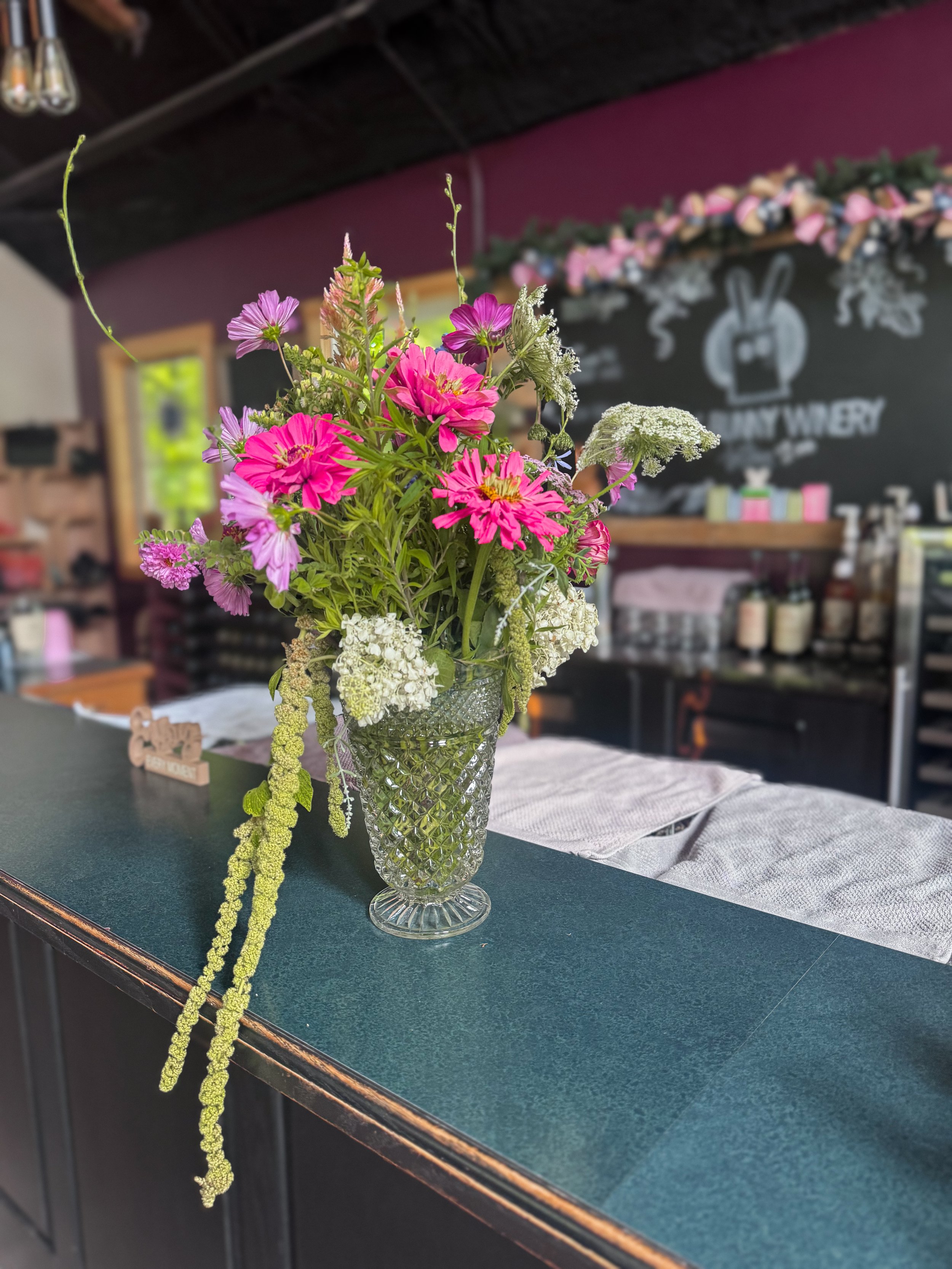 Romantic summer wedding floral centerpiece by a Loudonville, Ohio wedding florist