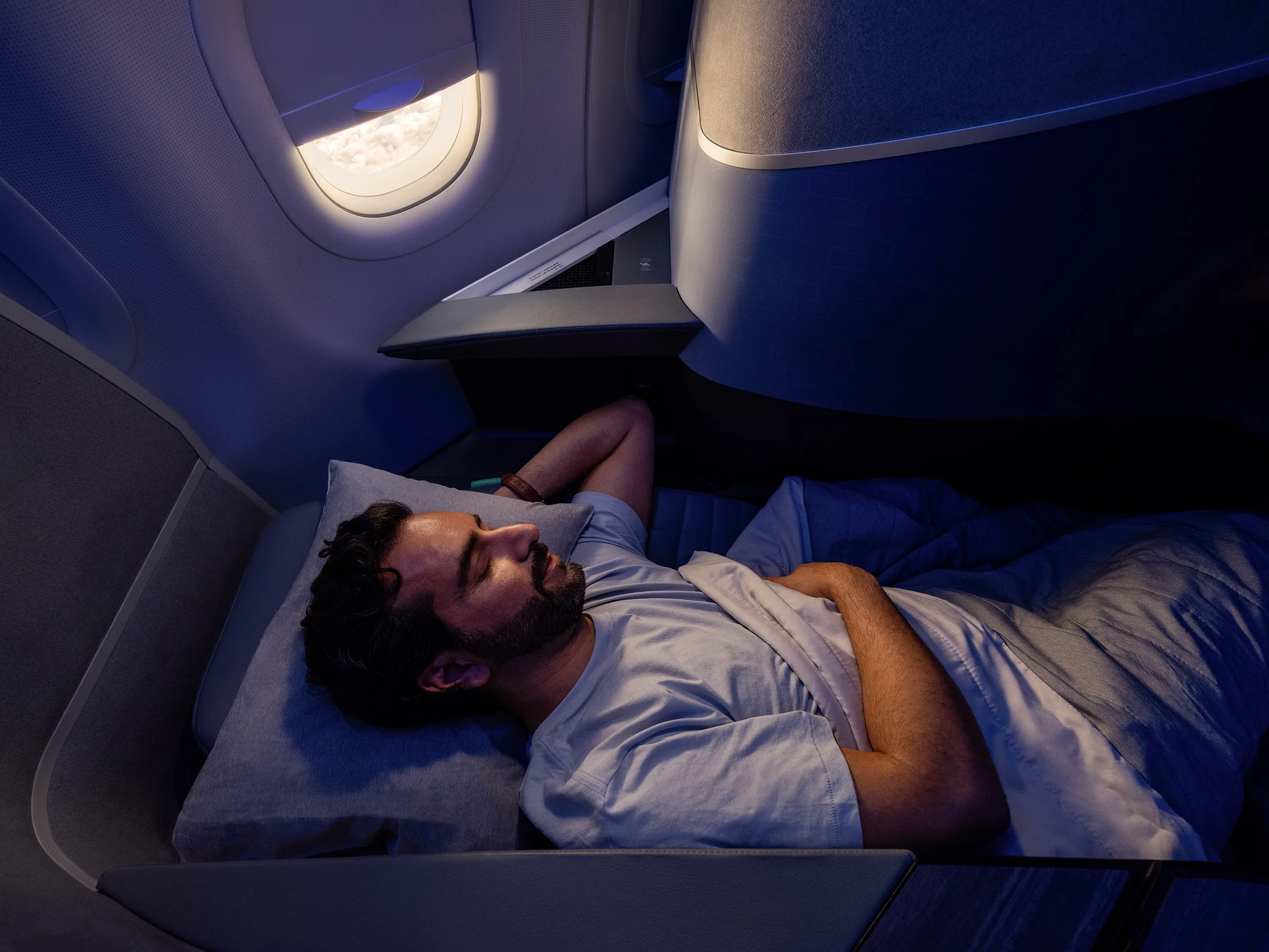 JetBlue Day to Night Man sleeping.jpg
