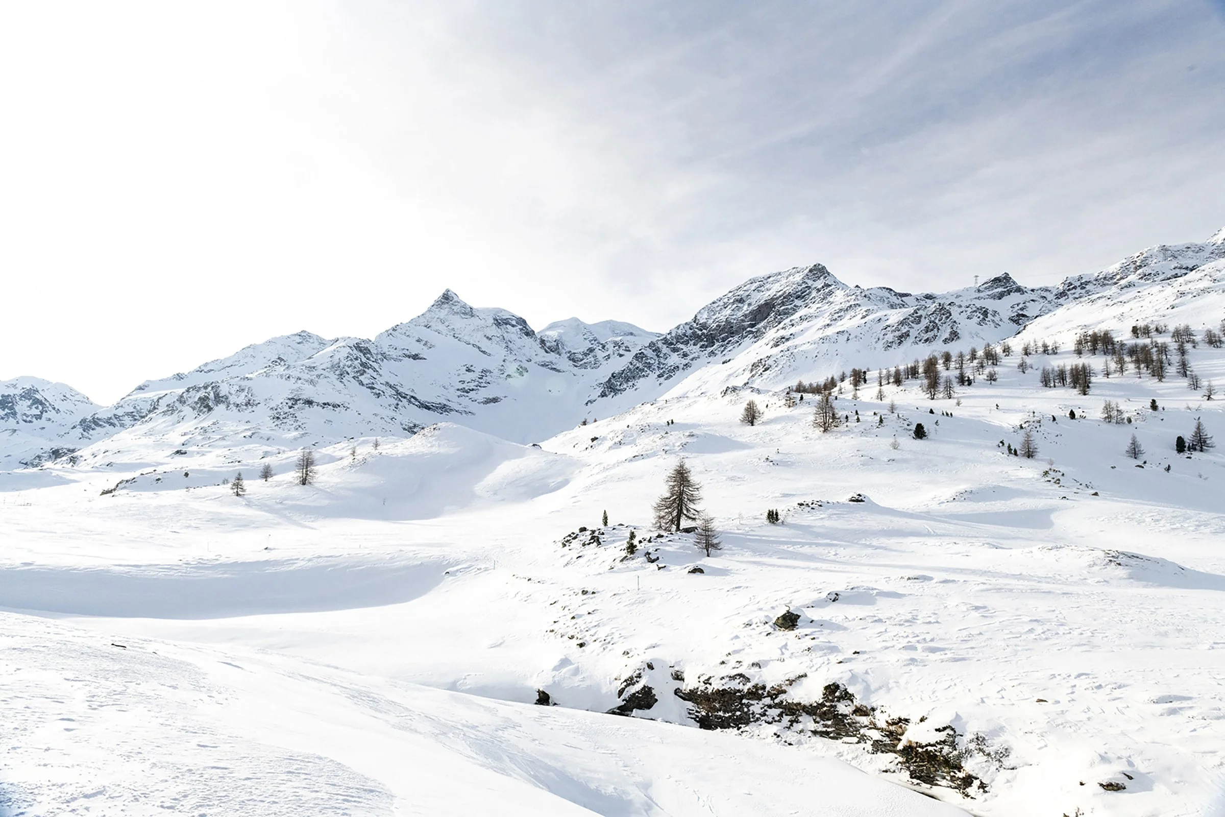 Bernina Express-3 Switzerland Alps Train Rail Travel Snow Landscapel.jpg