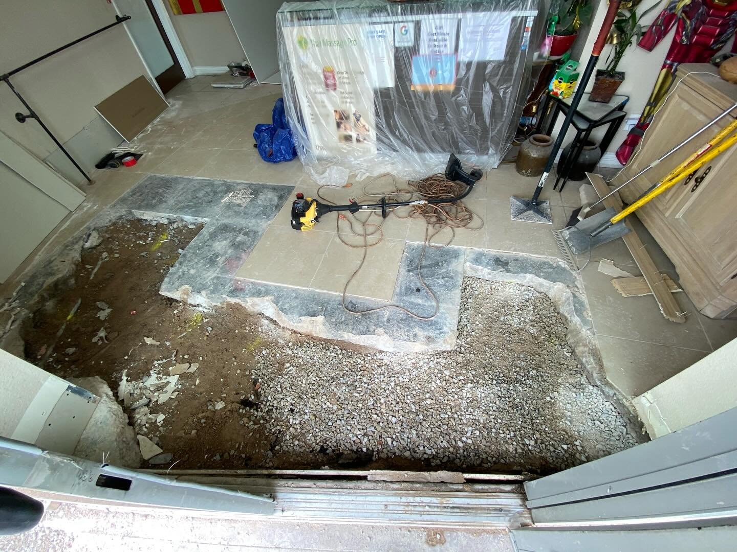 This pour-back came with a concern by the tenant that incorrect concrete installation would lead to a problem replacing the tile, and ultimately keep the business closed longer. To ensure the tile guys had enough room for thinset and tile installatio