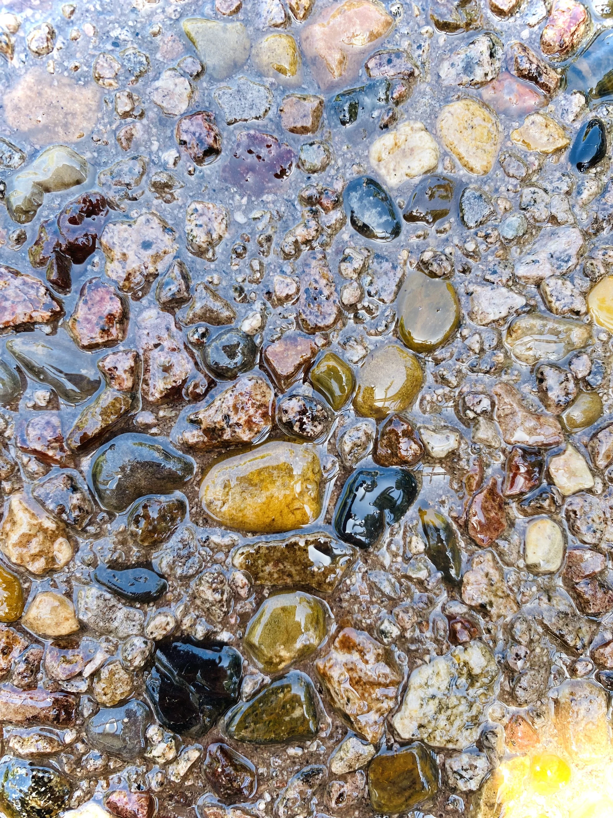 Custom dyed exposed finish with hand-selected specialty aggregate