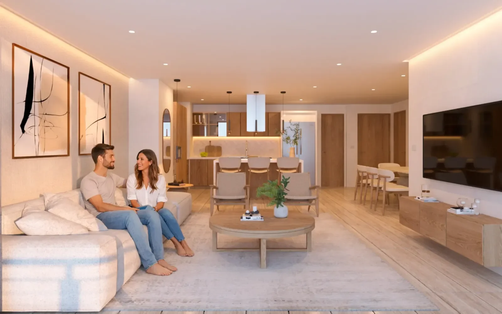 Sala interior en departamento de Artemisa Cancún con diseño moderno, iluminación cálida y área de convivencia
