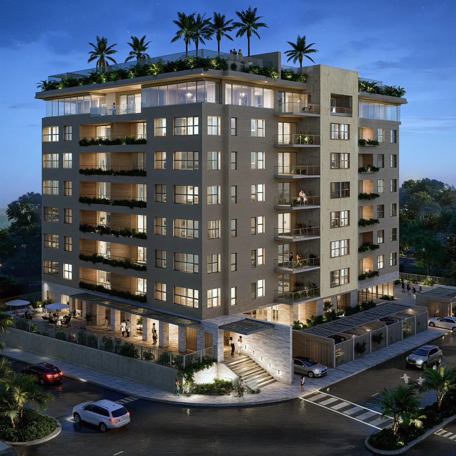 Edificio residencial de Artemisa Cancún con balcones, rooftop y áreas iluminadas durante la noche en entorno urbano