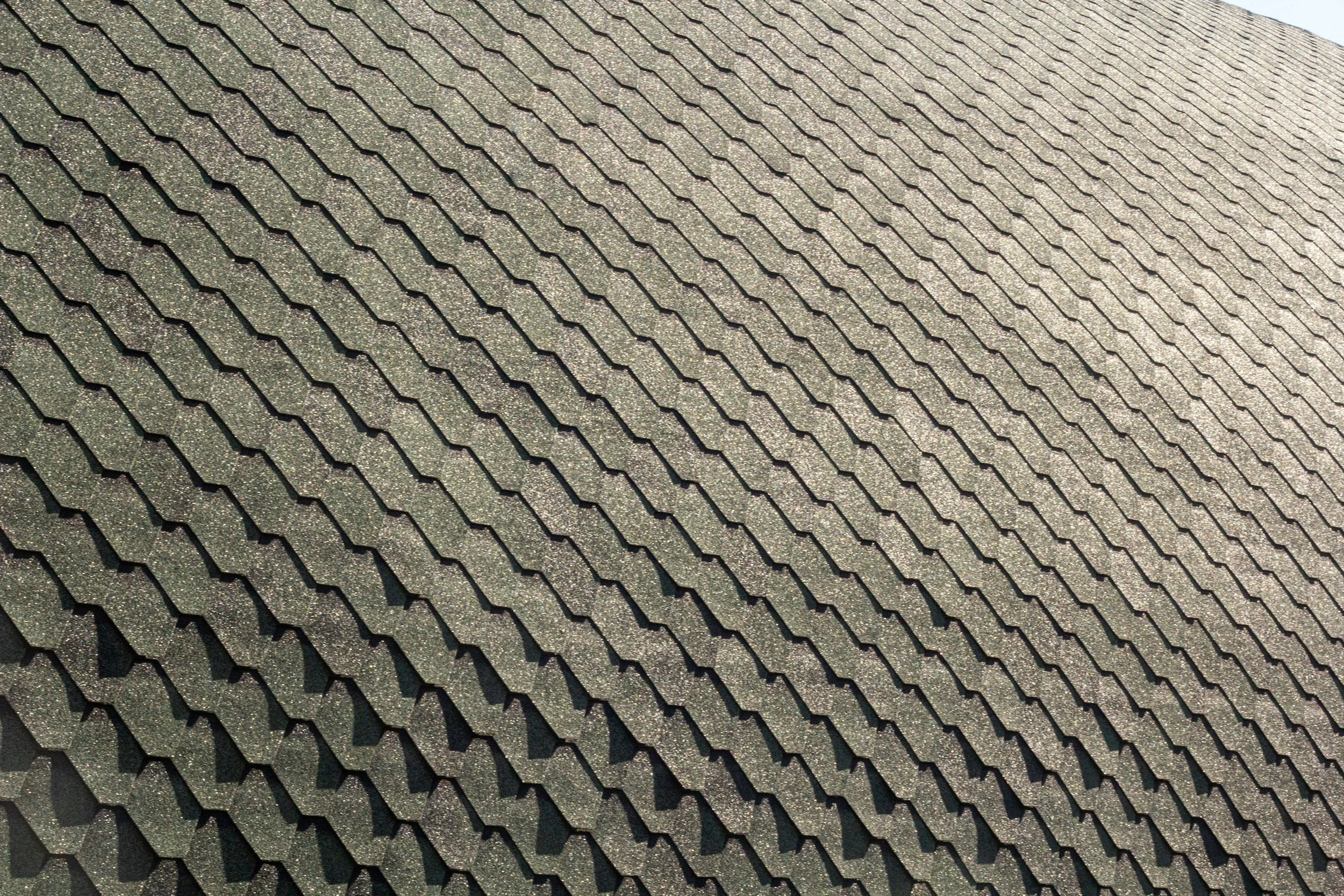Asphalt shingles used by local howard county md contractor for pitched roofs