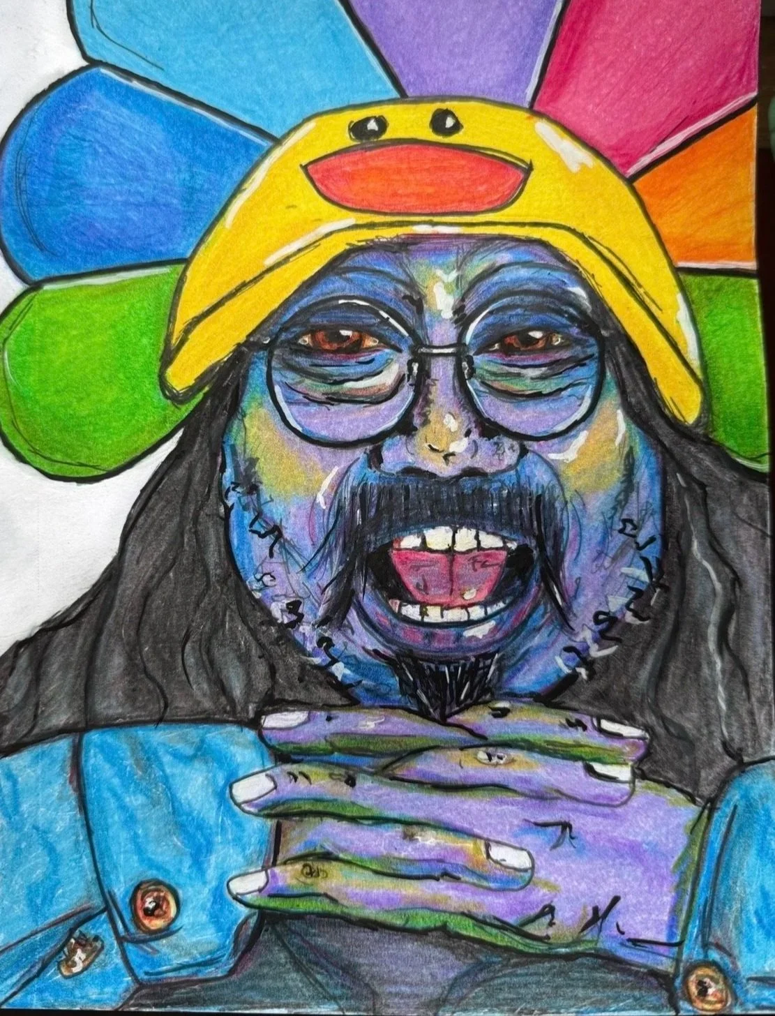 A colorful, expressive drawing of a person with glasses and a beard, wearing a yellow hat with a red smiling face, set against a rainbow-colored background.