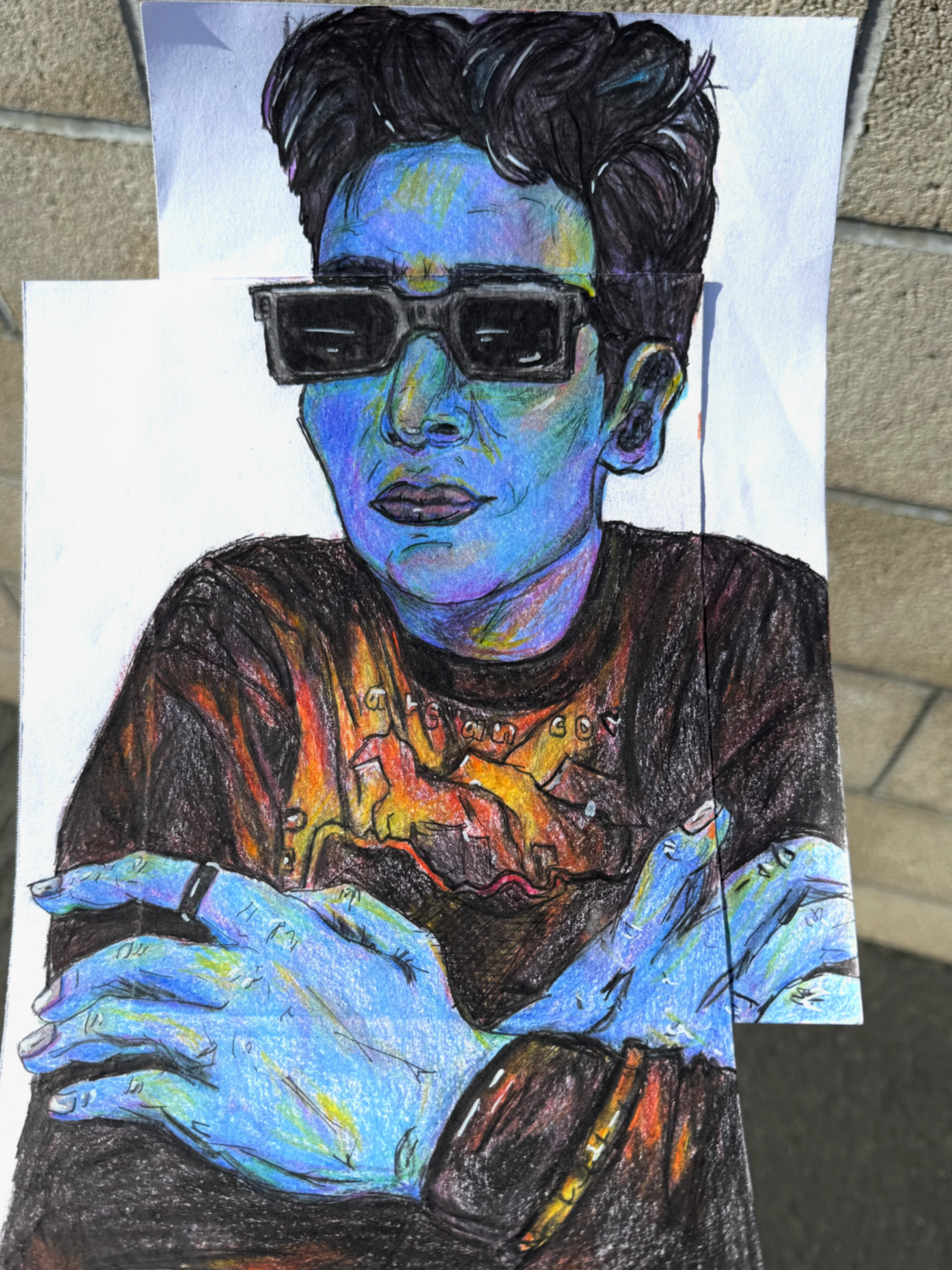 Colorful portrait of a person with short hair wearing sunglasses, a graphic t-shirt, and a ring, crossing their arms.