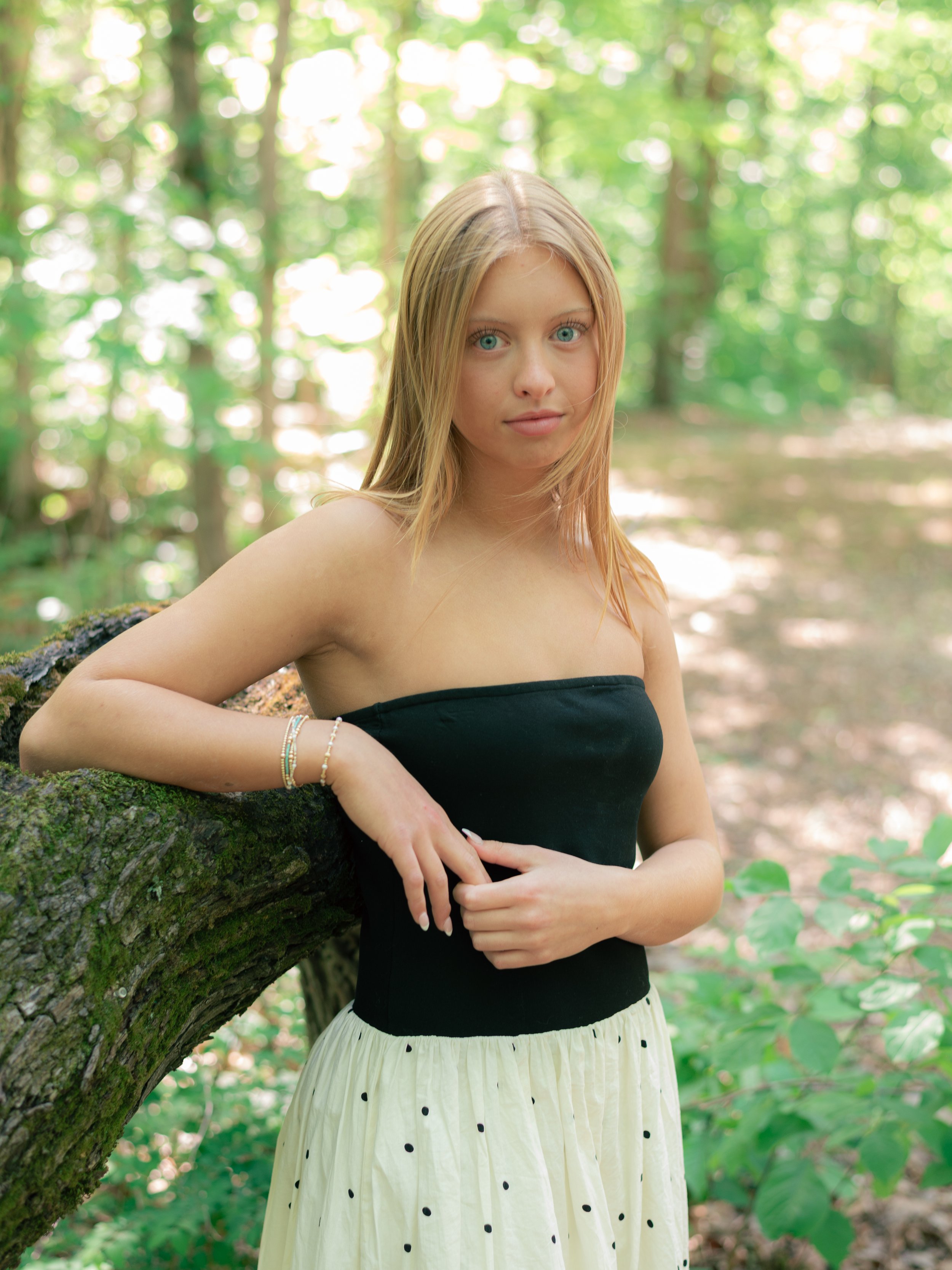 Blonde girl senior portrait natural