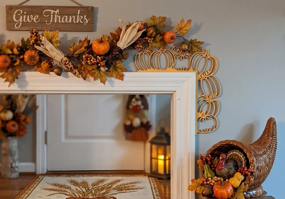 Decorated mirror corner with custom wooden pumpkin shapes.