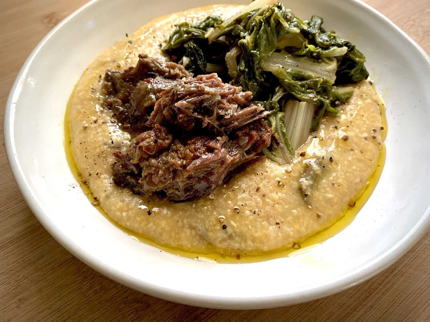 Rosemary-Braised Beef Cheek with Swiss Chard &amp; Porcini Polenta