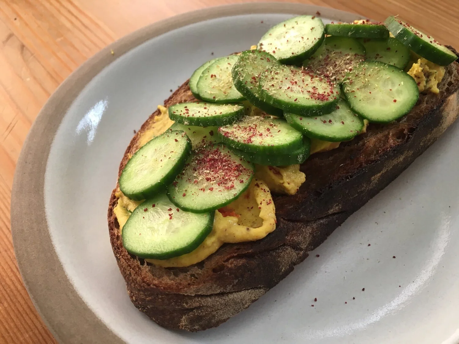 Hummus Toast with Persian Cucumbers, Blue Fenugreek, &amp; Sumac