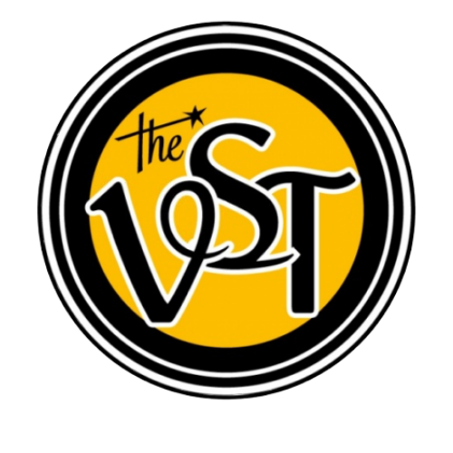 Logo of The Lost, featuring a yellow circle with black and white border, text 'The Lost' with a star attached to the 'T' in a stylized font.