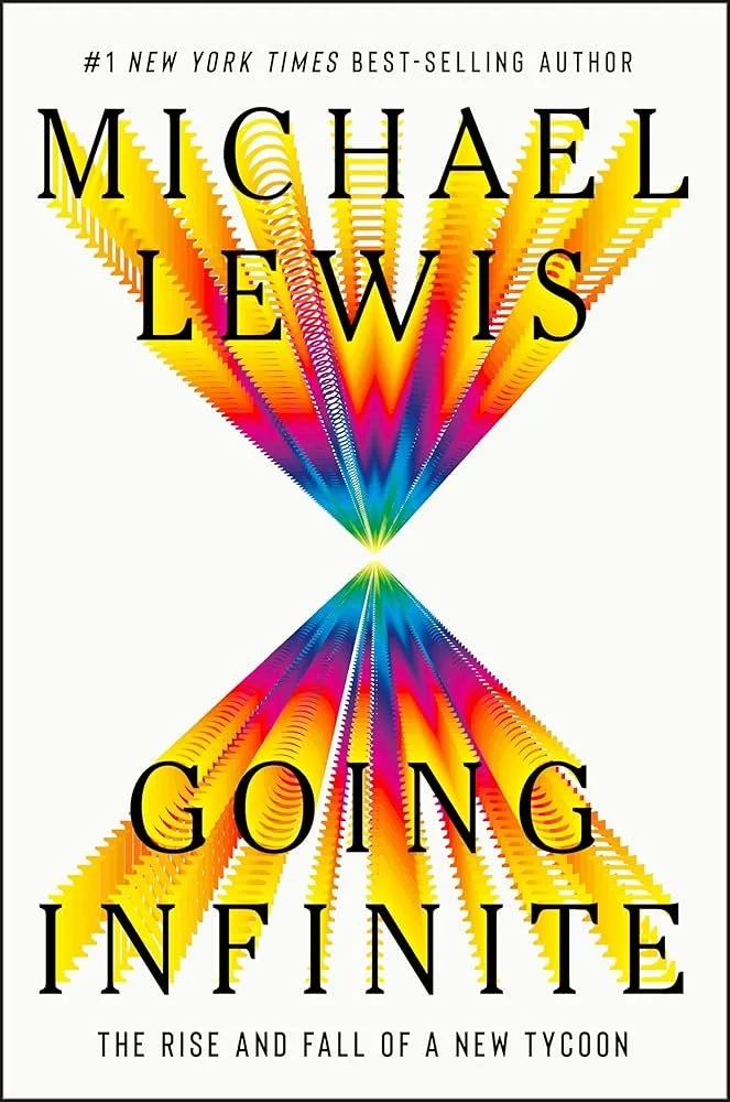 Book cover of "Going Infinite" by Michael Lewis, with colorful, symmetrical, pixelated pattern resembling an hourglass or infinity symbol.