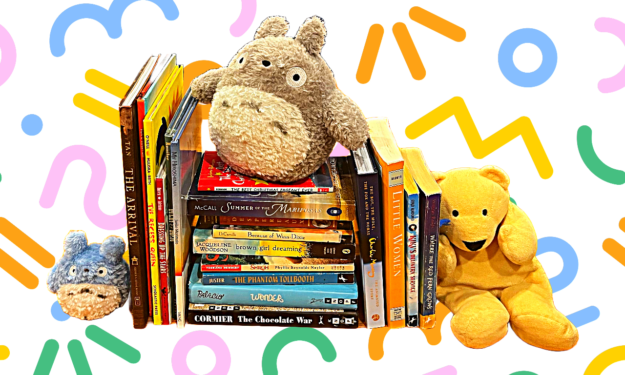 A collection of children's books arranged like a shelf, topped with plush animal toys including a large beige bear, a smaller grey and beige creature, and a yellow bear, with a colorful, abstract background.