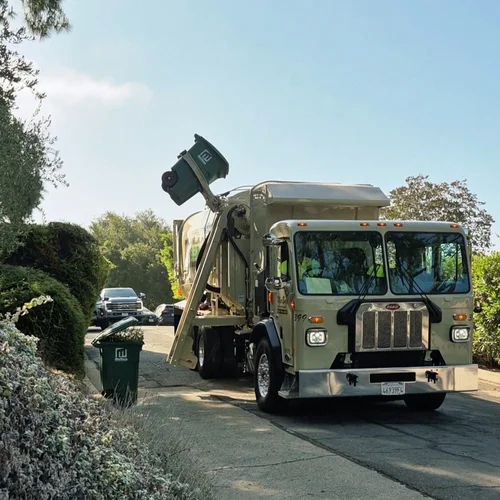 MarBorg truck collecting a bin curbside