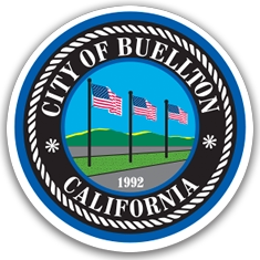 The official seal of the City of Buellton, California, featuring three American flags on poles over green land, with a blue sky background, encircled by the words 'City of Buellton California 1992'.