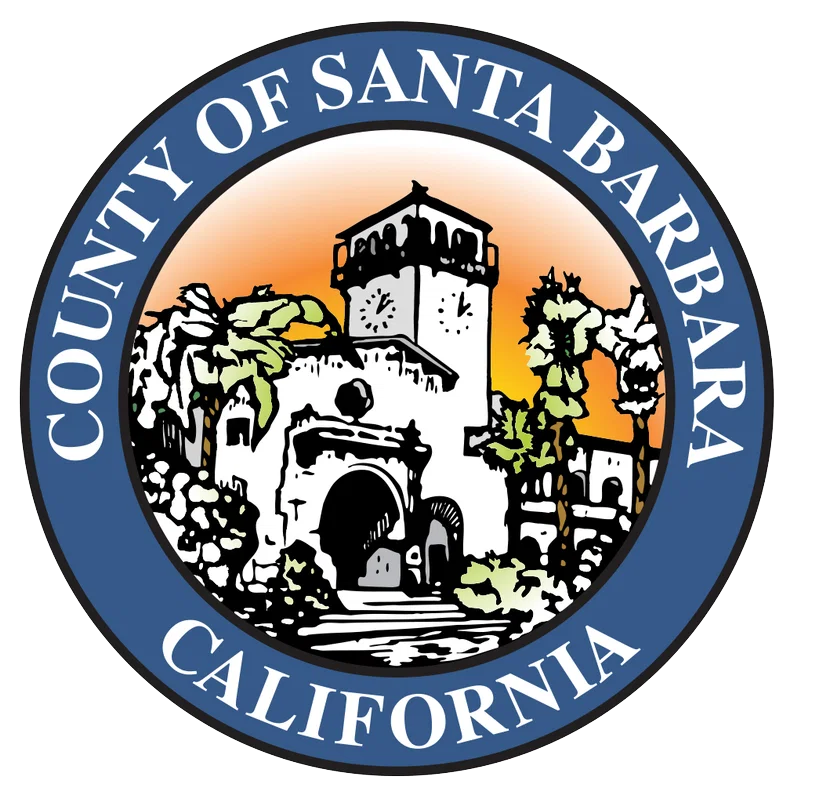 Seal of Santa Barbara County, California, featuring a castle tower, trees, and a sunset background.