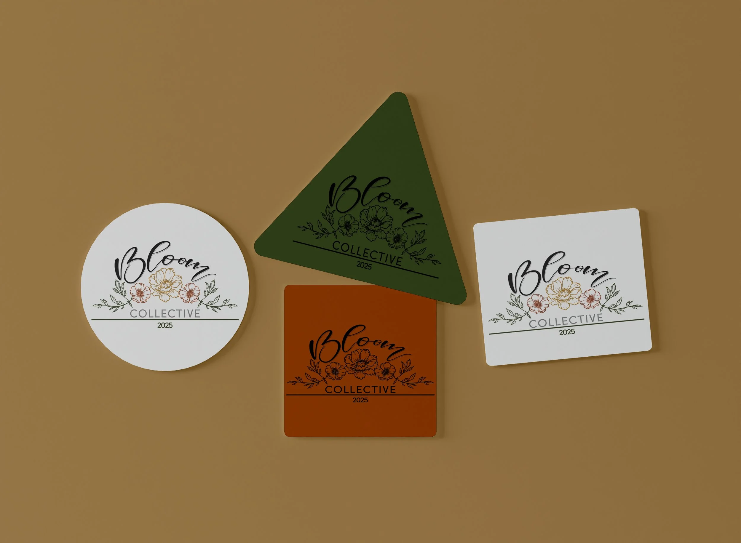 Three business cards for Bloom Collective with floral designs and the year 2025, on a brown background.
