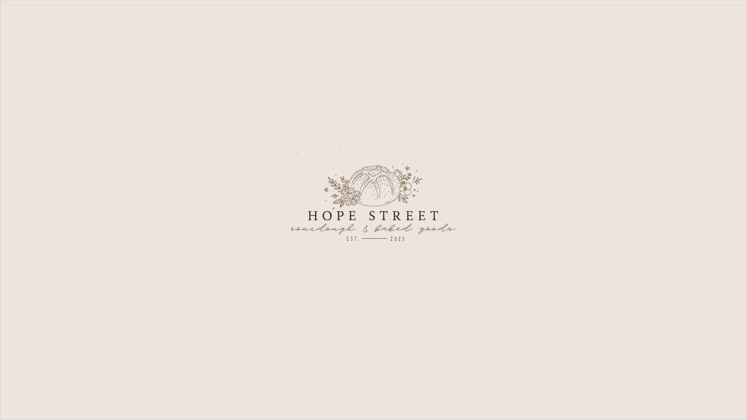 A light beige background with a small, detailed illustration of a loaf of bread surrounded by flowers and leaves. Below the illustration, the text reads 'Hope Street' in uppercase letters, with a smaller script below it that says 'sourdough & baked goods'. Further below, it states 'Est. 2025'.