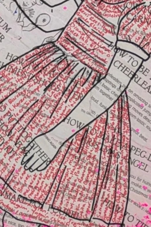 Closer. Every line of red on her dress is a name. 124 women and girls killed by men in the UK in 2022. She wears them.