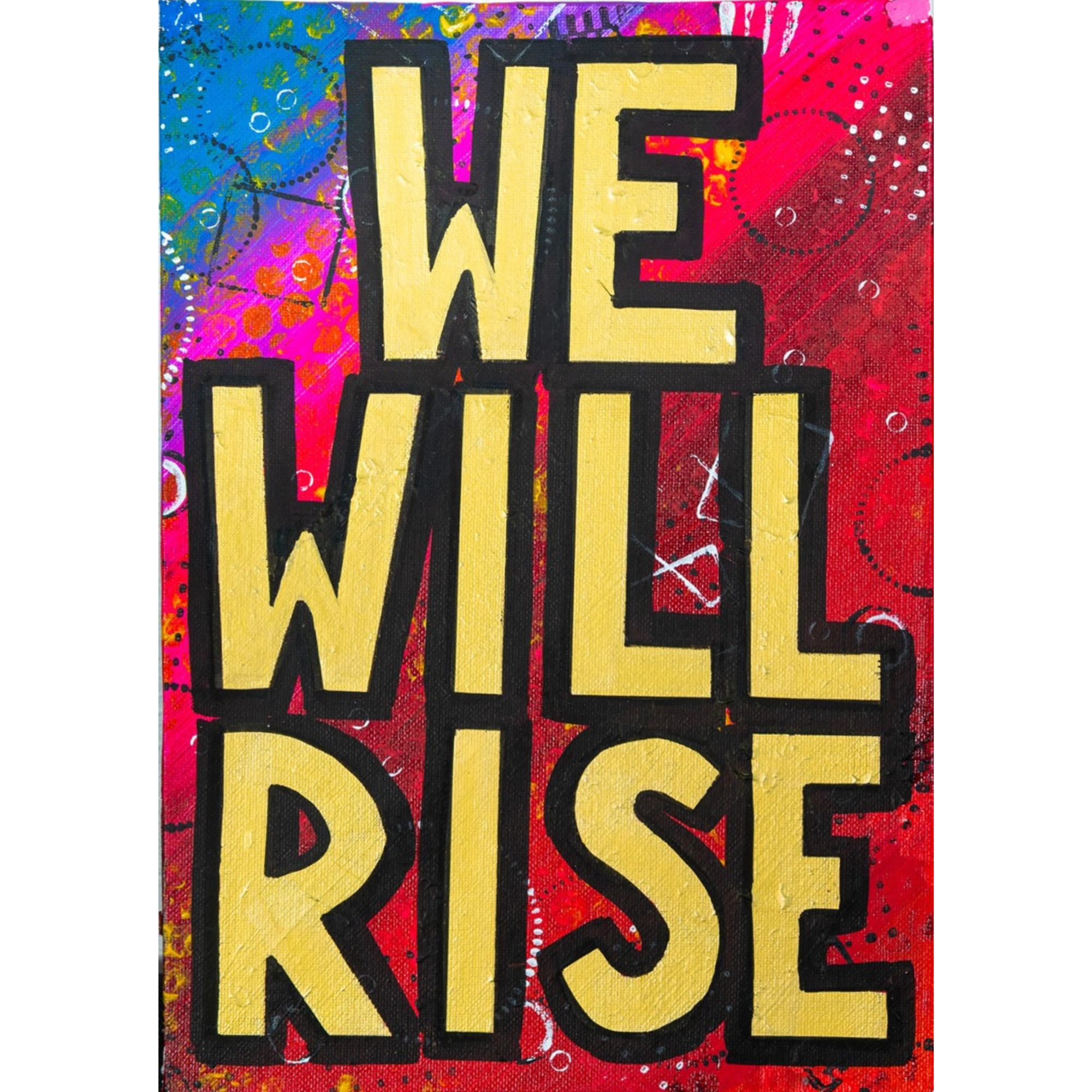 We Will Rise small round pin badge, bold Posca lettering over a bright splattered painted background.