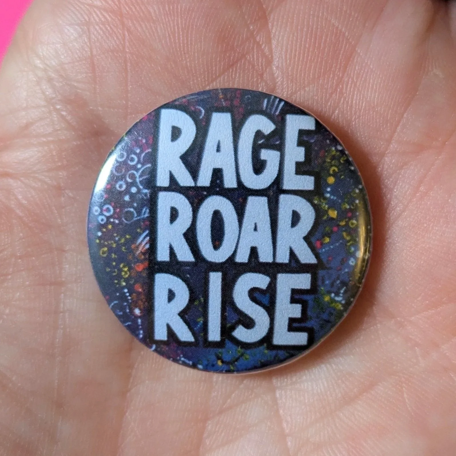 Rage Roar Rise Pin Badge