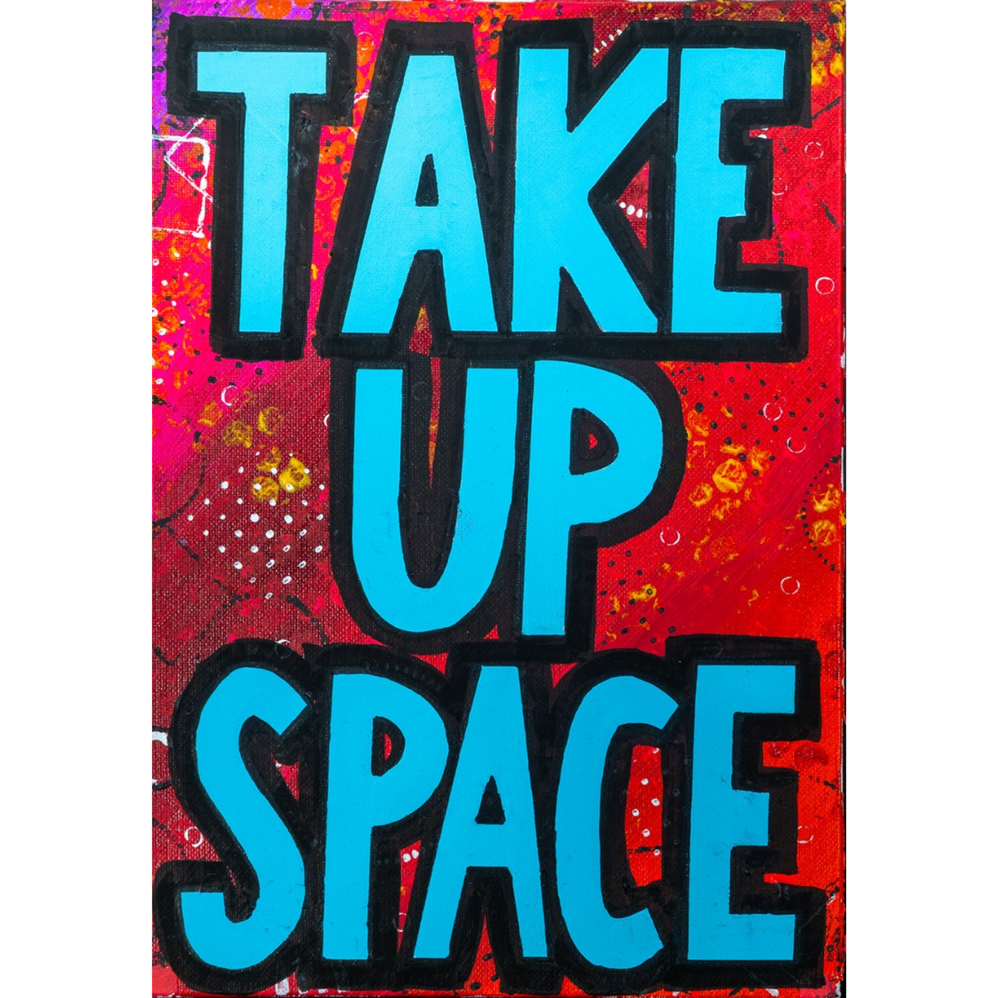 Take Up Space small round pin badge, bold Posca lettering over a bright splattered painted background.