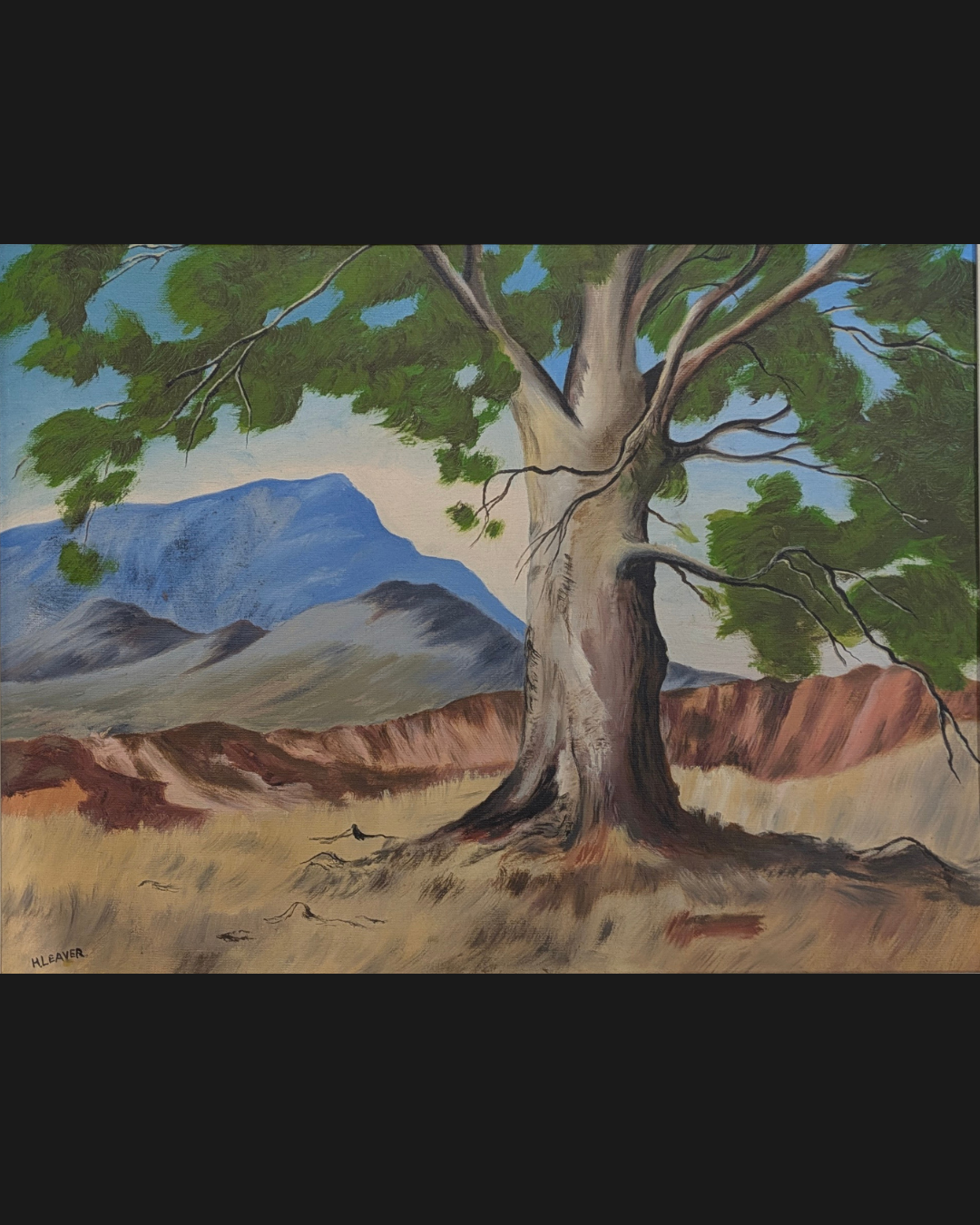 The Henry Leaver landscape. Where it started. A tree, a mountain, somebody else's quiet countryside scene, painted over and gessoed out to become the ground for something with a lot more to say.