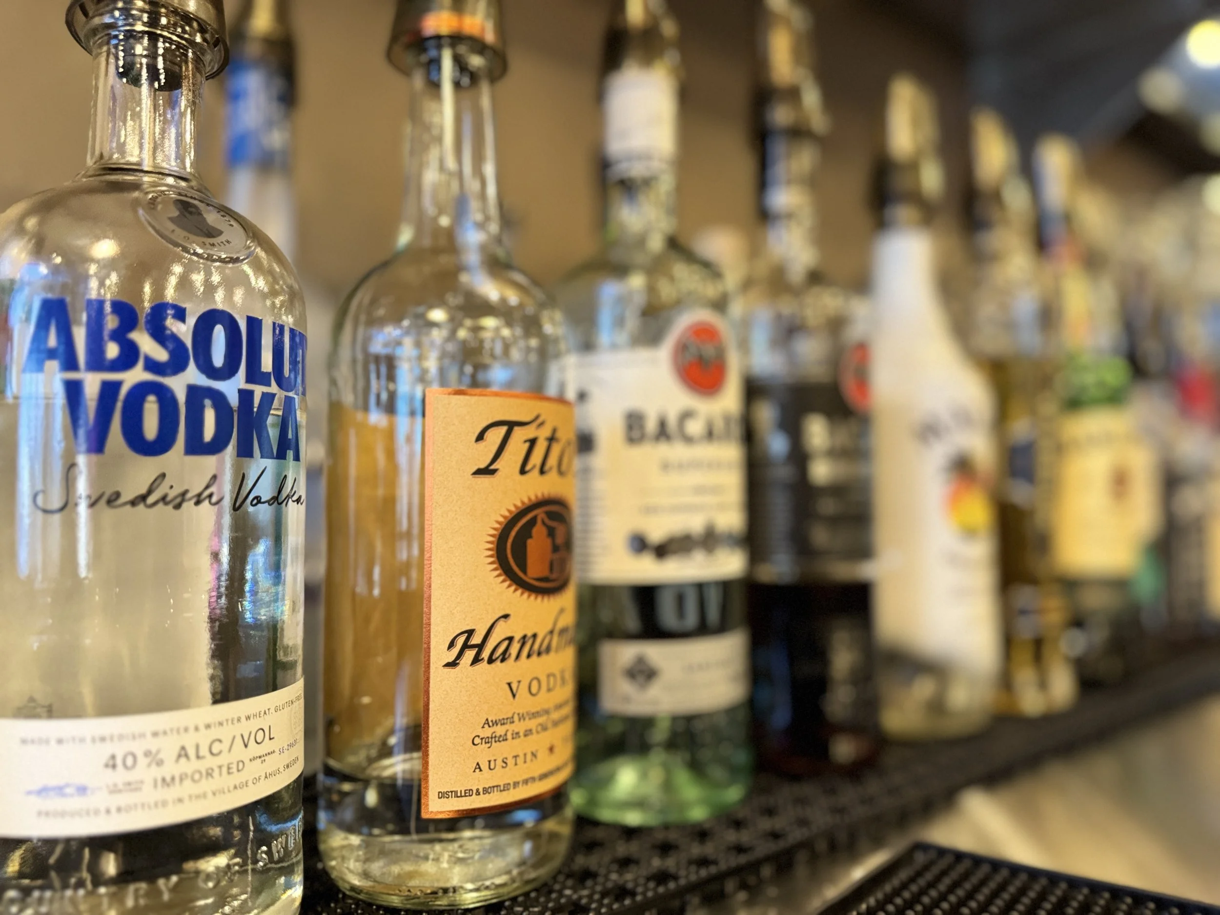 full service bar handmade bamboo by owner. all liquors, custom drink menu, sake, wine, beer, margaritas, specialty drinks, prosecco, titos, absolute, tv