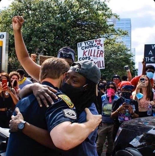 Photo Credit: Daniel Franco. I pray that we may learn to love one another like this. We are not enemies. We are brothers and sisters.