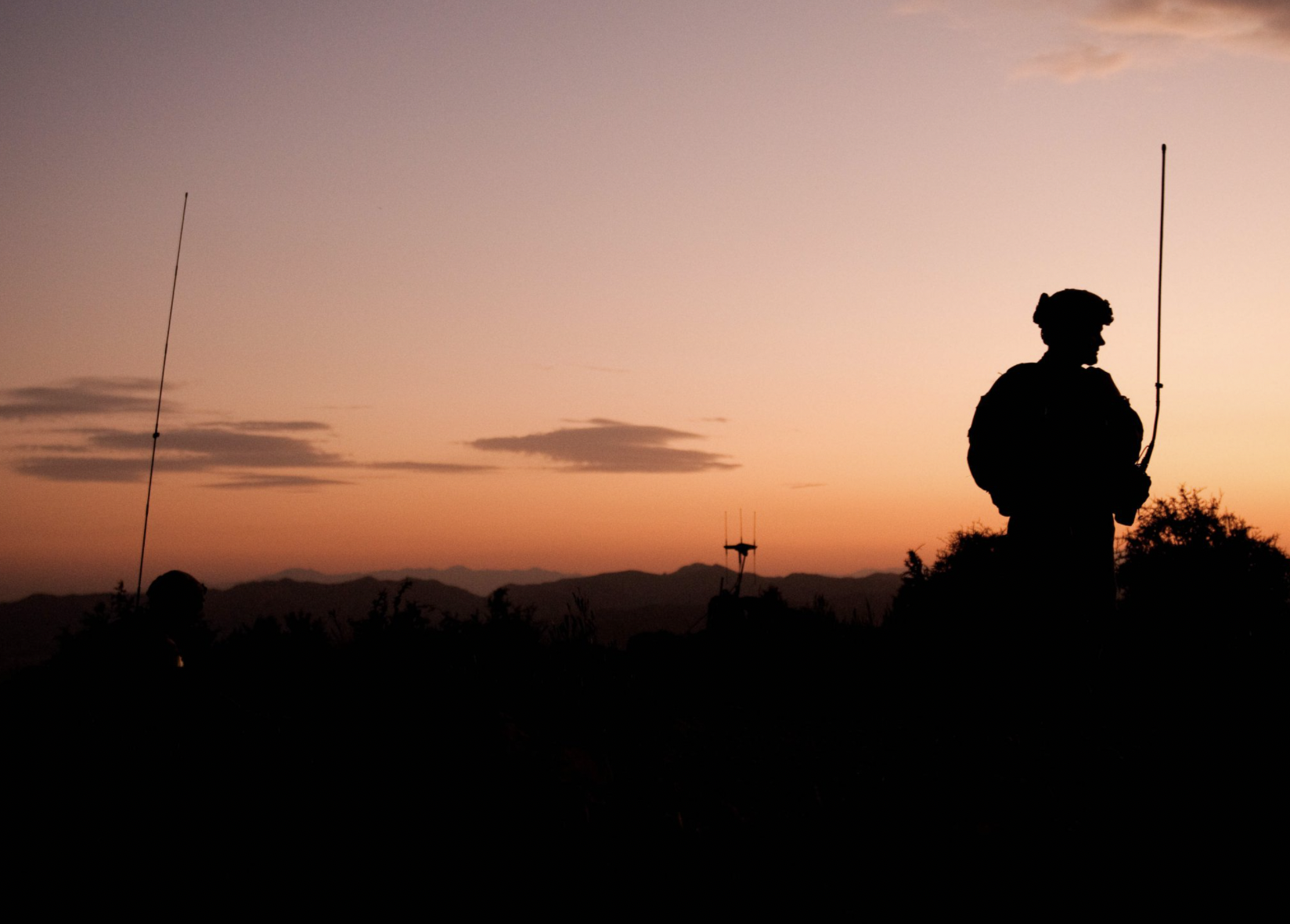 A soldier performs a radio check atop Little Gherghara in Afghanistan’s Sabari district in 2012. Army photo by Sgt. Christopher Bonebrake.