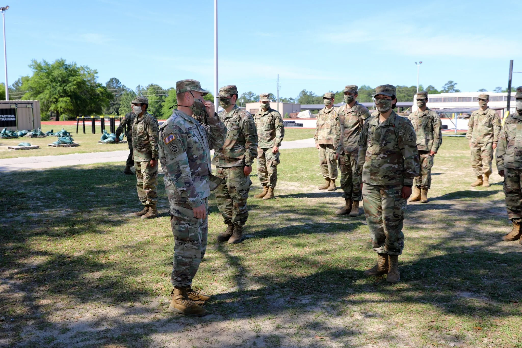 Lt. Col. Jacob White, commander of 2nd Battalion, 58th Infantry Regiment, talks with E Company soldiers after they received cloth face coverings from Combat Capabilities Development Command Soldier Center in Natick, Mass., April 27, 2020. Photo by Markeith Horace/Fort Benning Public Affairs Office, courtesy of DVIDS.