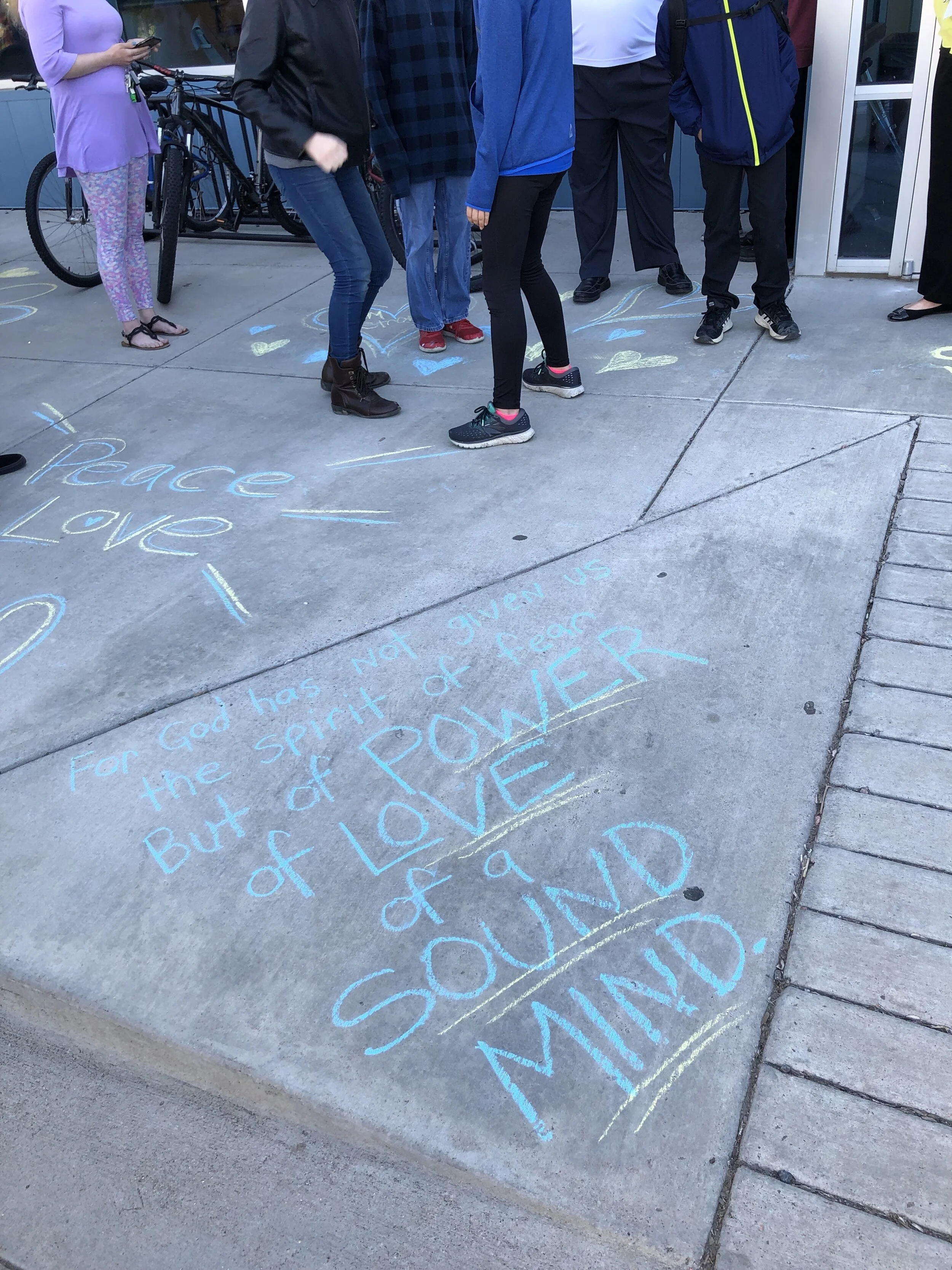 Chalk on the ground outside of STEM School Highlands Ranch