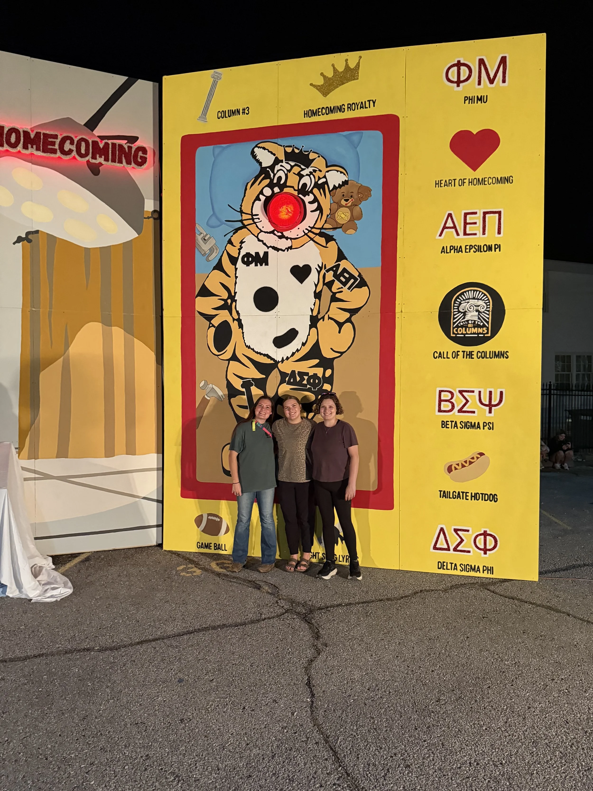 Hannah with her sisters at MU's homecoming