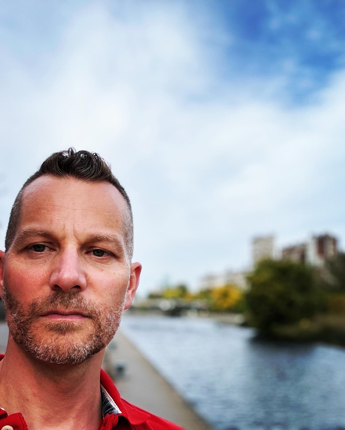 François Duguay, founder of Two Loop Consulting, outdoors near the waterfront in Montréal.