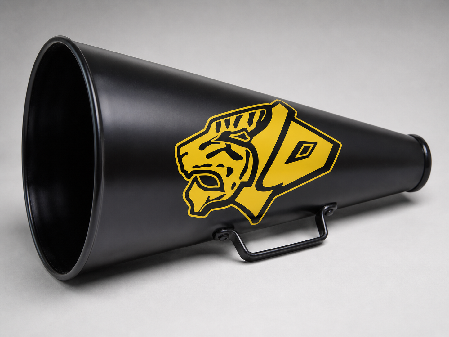 Black noise horn with a yellow logo of a fierce lion's head and a shield.