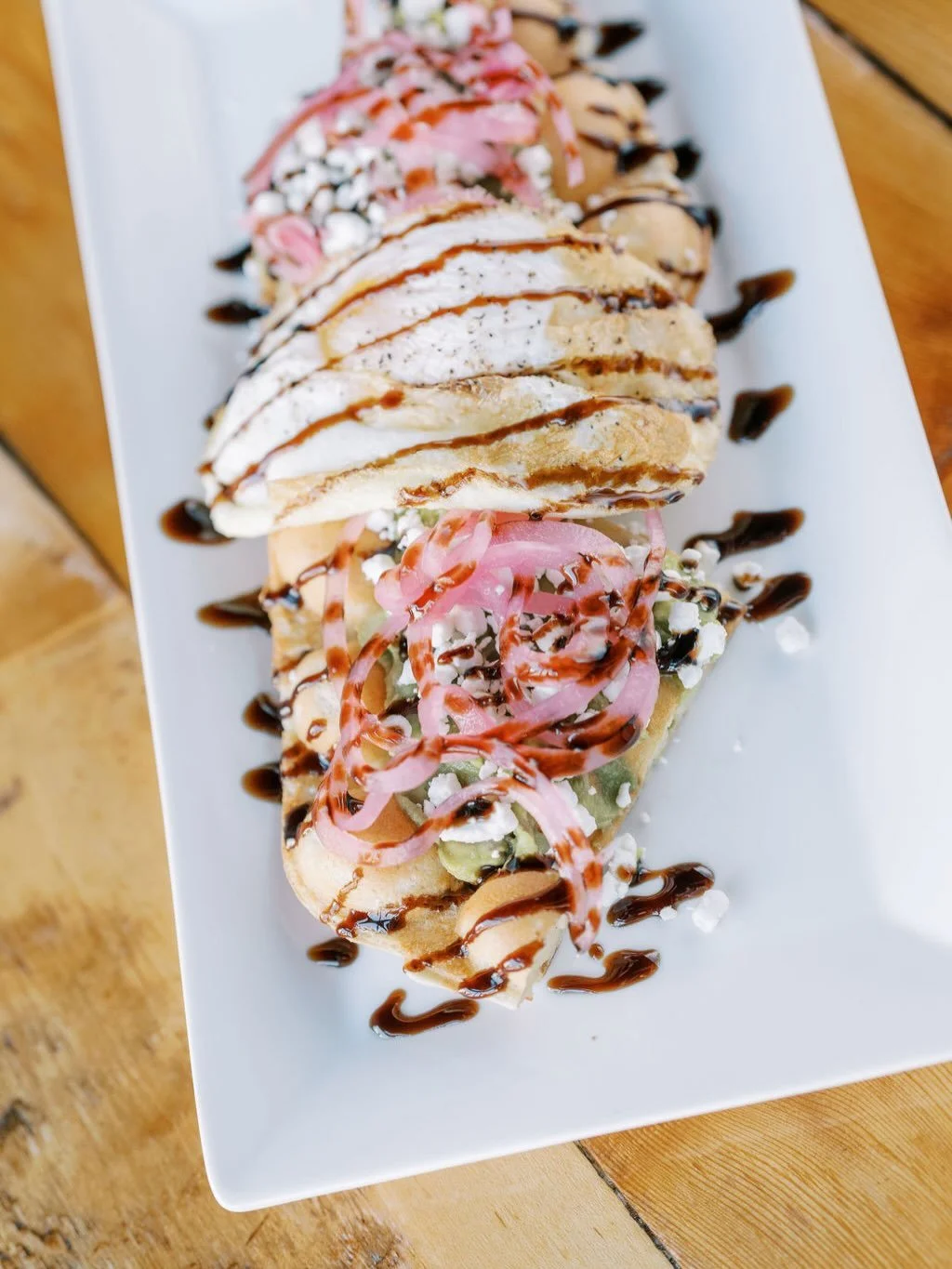 Who doesn&rsquo;t love a good avocado toast?! Here at The Exchange, we do it up right with our Sunny Side Up feature!

Toasted bubble waffle half, smashed avocado, one egg, pickled onion, goat cheese crumbles and balsamic reduction

.
.
#theexchangec