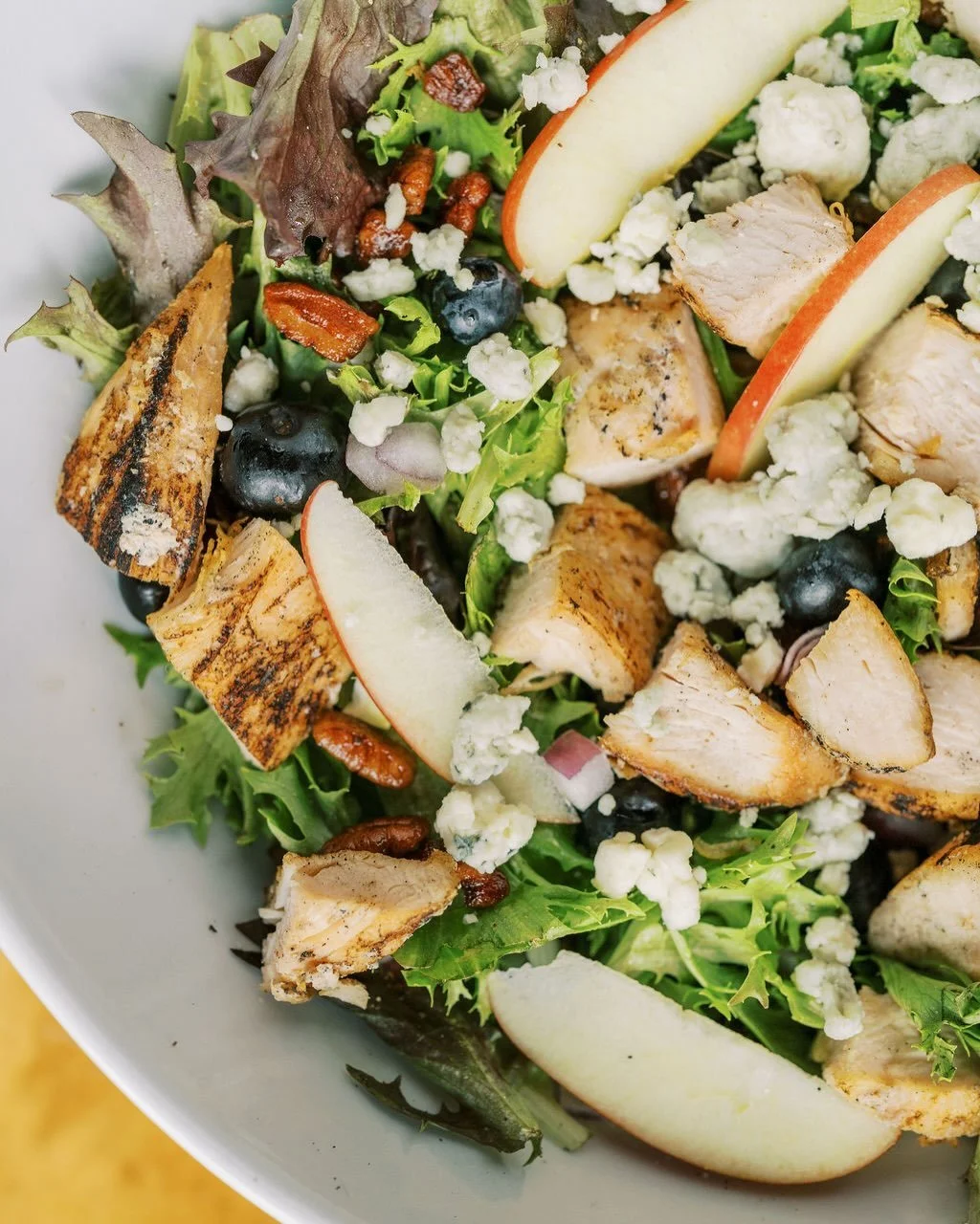 Our salad feature for the Summer:

GRILLED CHICKEN BLUE SALAD

rilled chicken | candied pecans | sliced apples | blueberries | red onion | bleu cheese crumbles| balsamic vinaigrette

.
.
#theexchangecoffee #coffeeshop #espresso #morethancoffeeandwaff