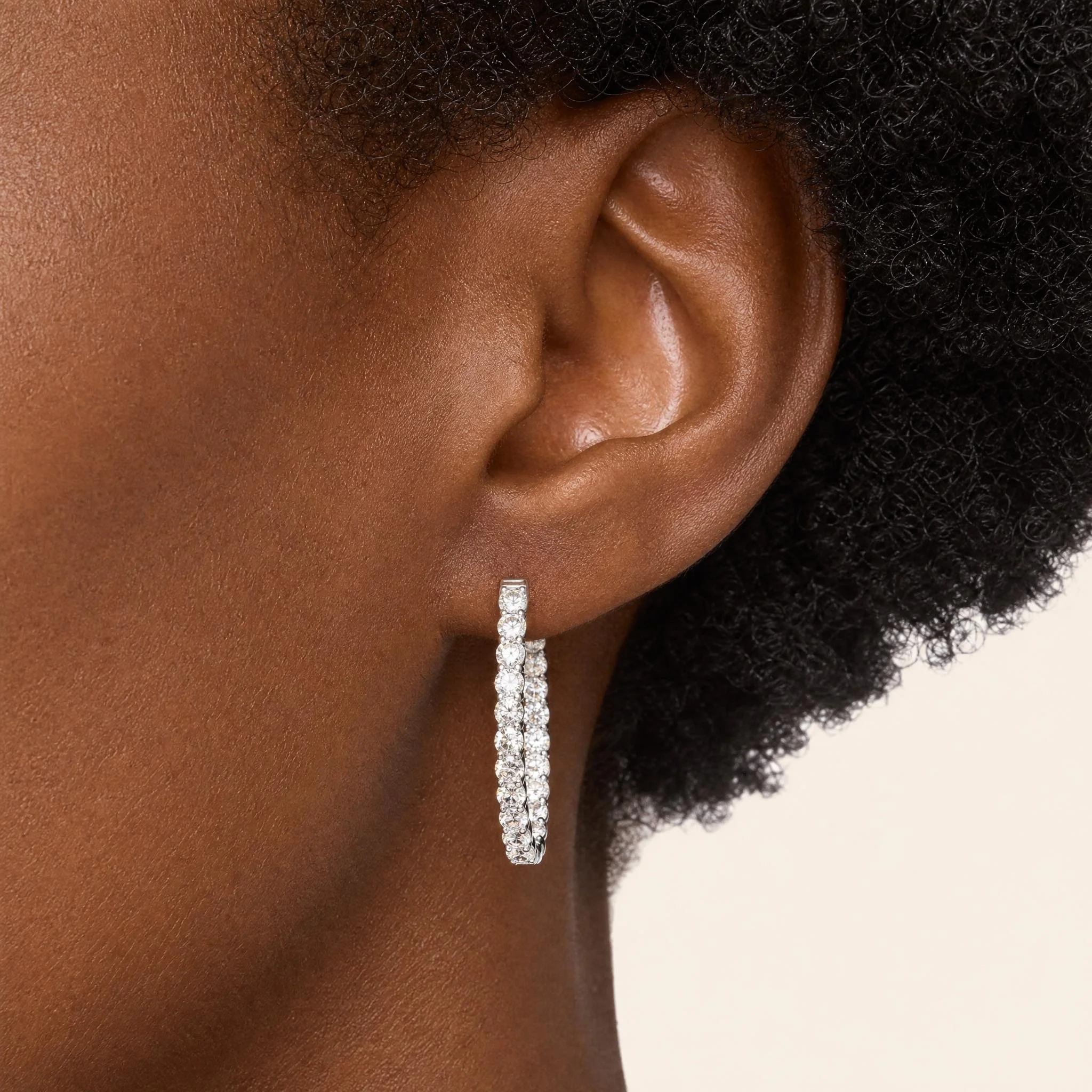 inside-out-diamond-hoop-earrings-white-gold on model.jpeg