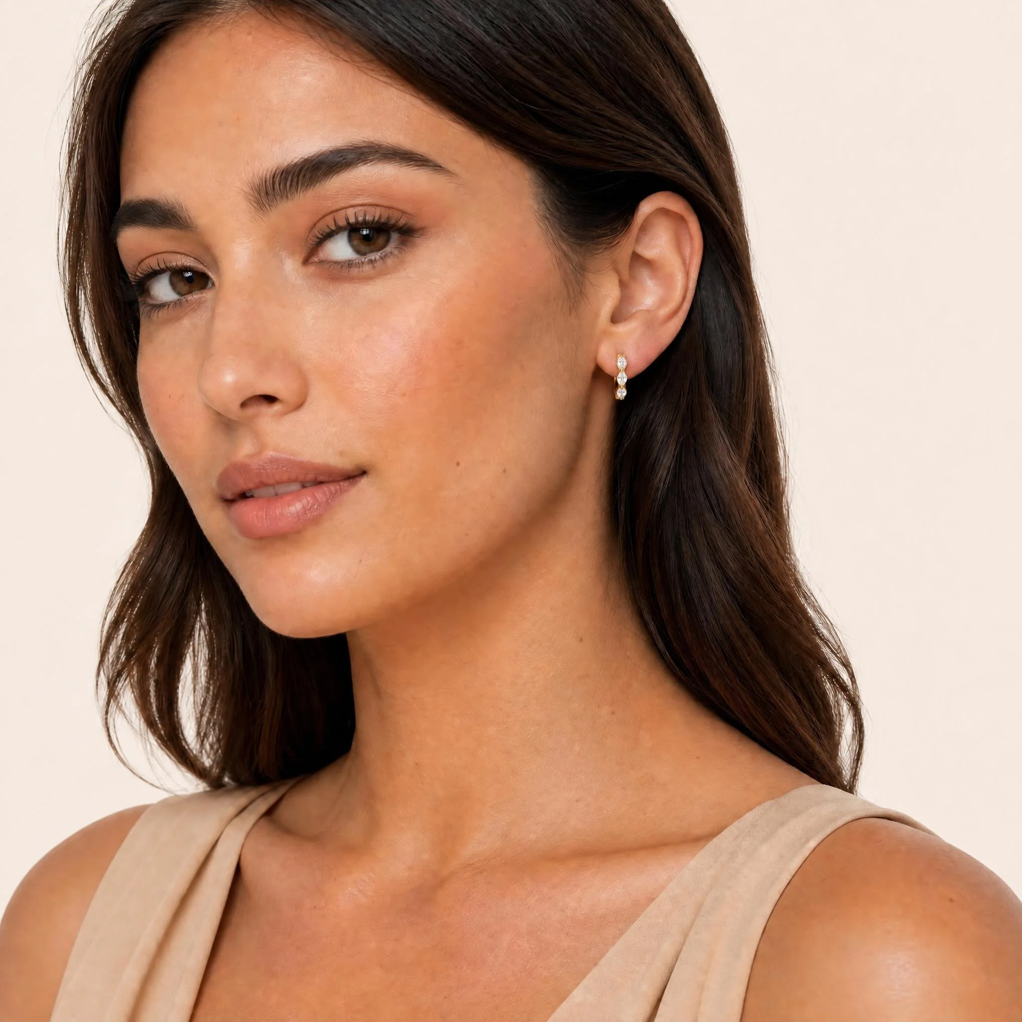14K yellow gold huggie hoop earrings with marquise-cut natural diamonds.jpeg