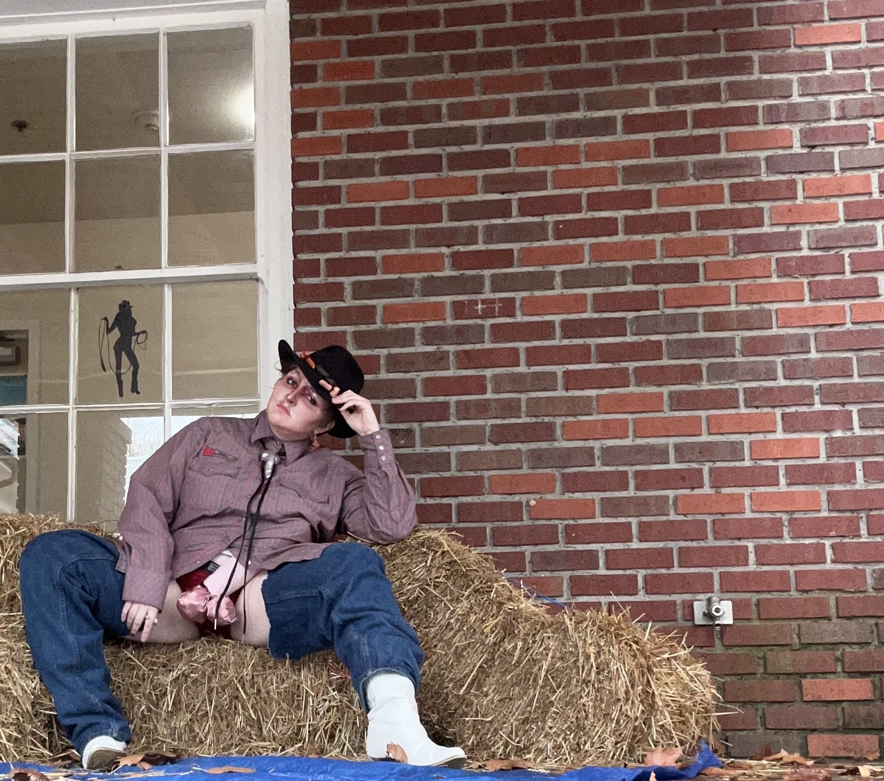 MEAT QT before performing their country number to "I Sucked Another Dick Last Night" by Wheeler Walker Jr. This number features a penis shaped hobby horse other things.