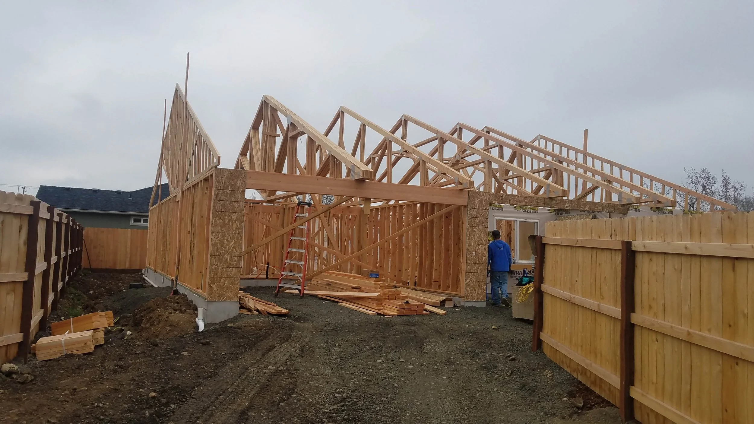 A new house's framing shows the structure of the home