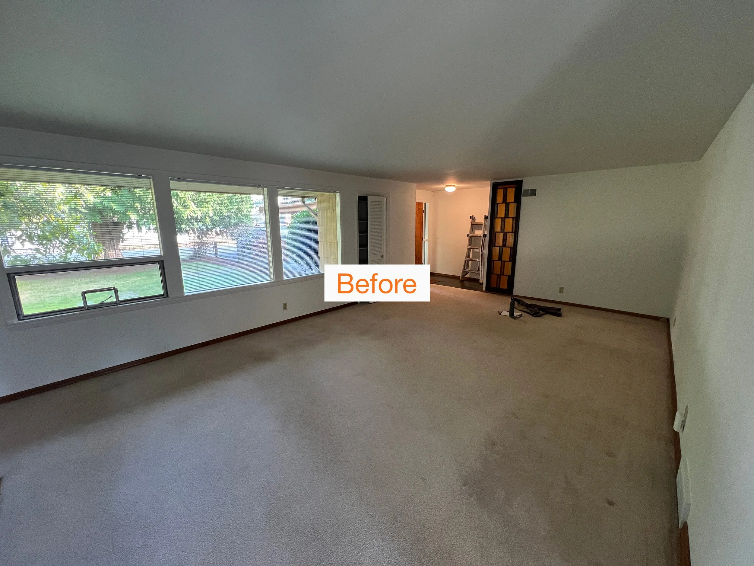 9-Burien-Renovation-Before-Living-room-with-Screen.JPG