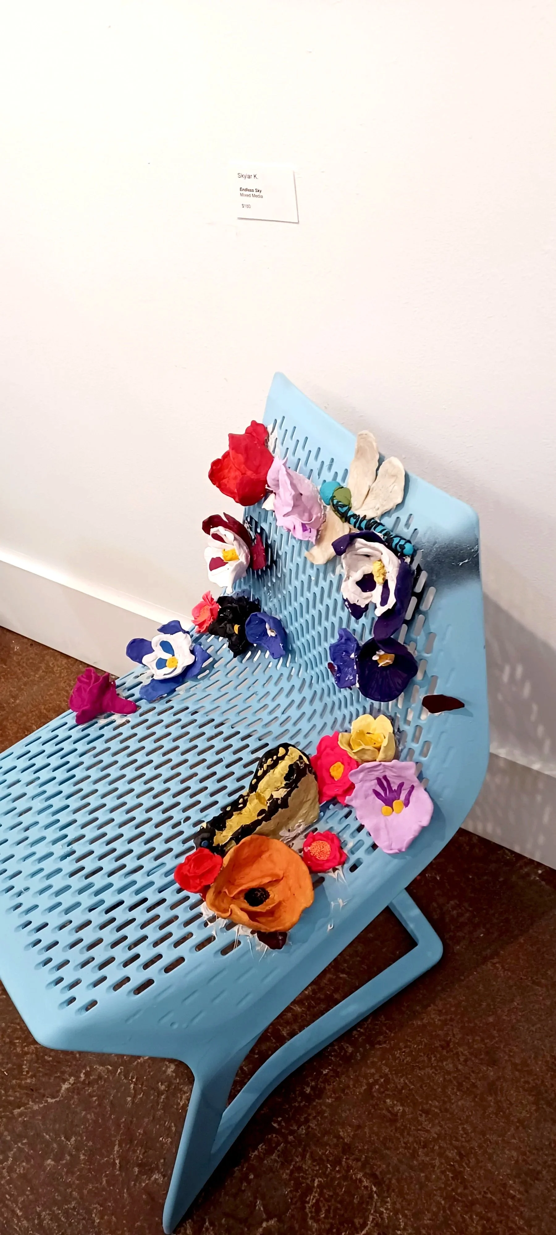 Skylar K. Endless Sky. Chair Art with polymer clay. 32 ×17.5in. Knoll Gallery