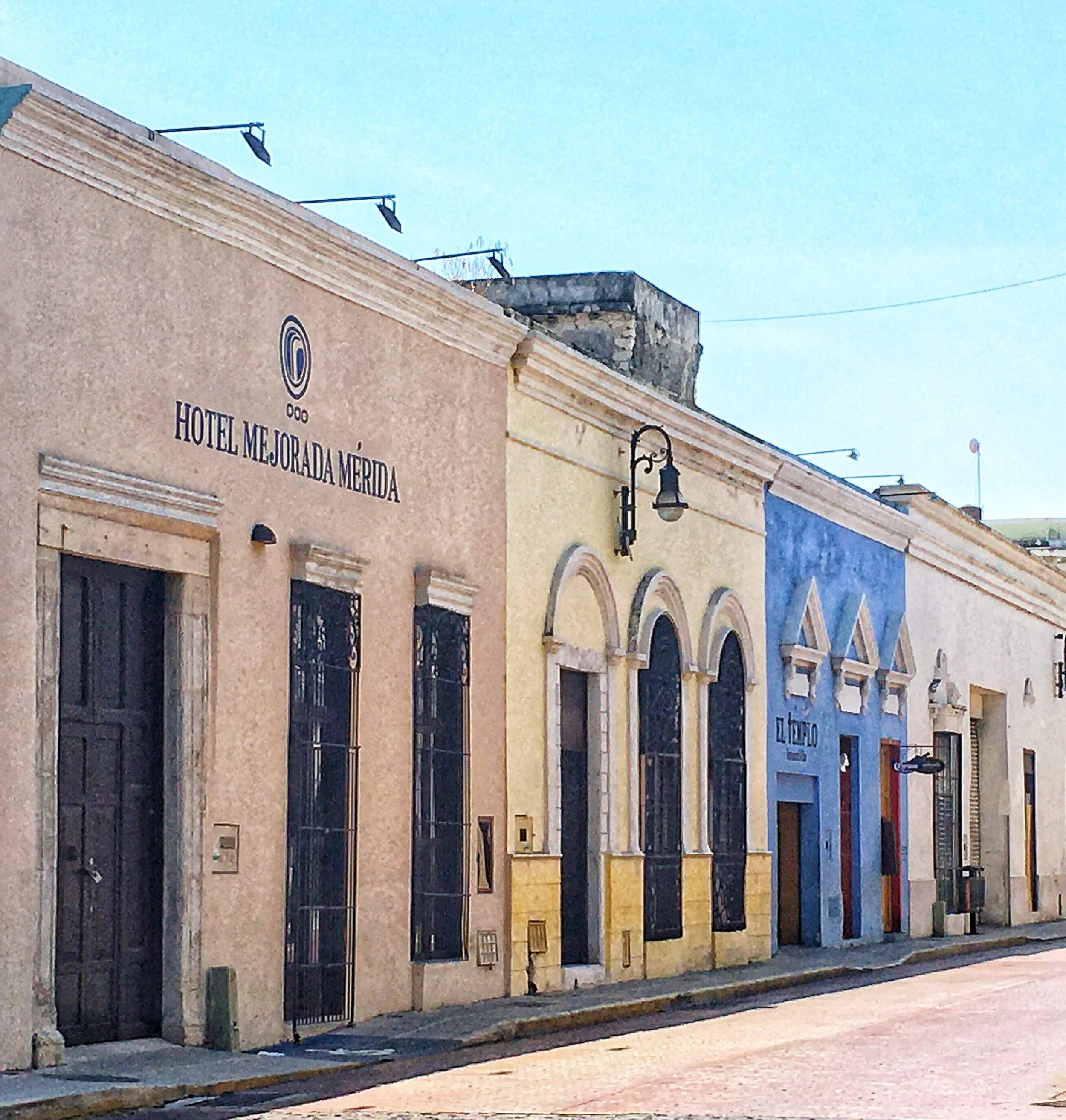 Block of colonial buildings including Hotel Mejorada and restaurant El Templo in Centro Mérida, Yucatán, Mexico.