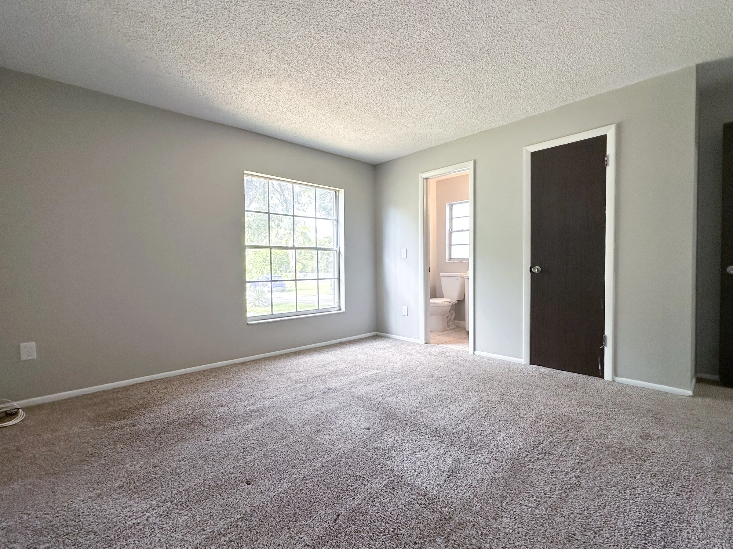 99th Ave _ House Rentals LLC _Master Bedroom 2.jpg