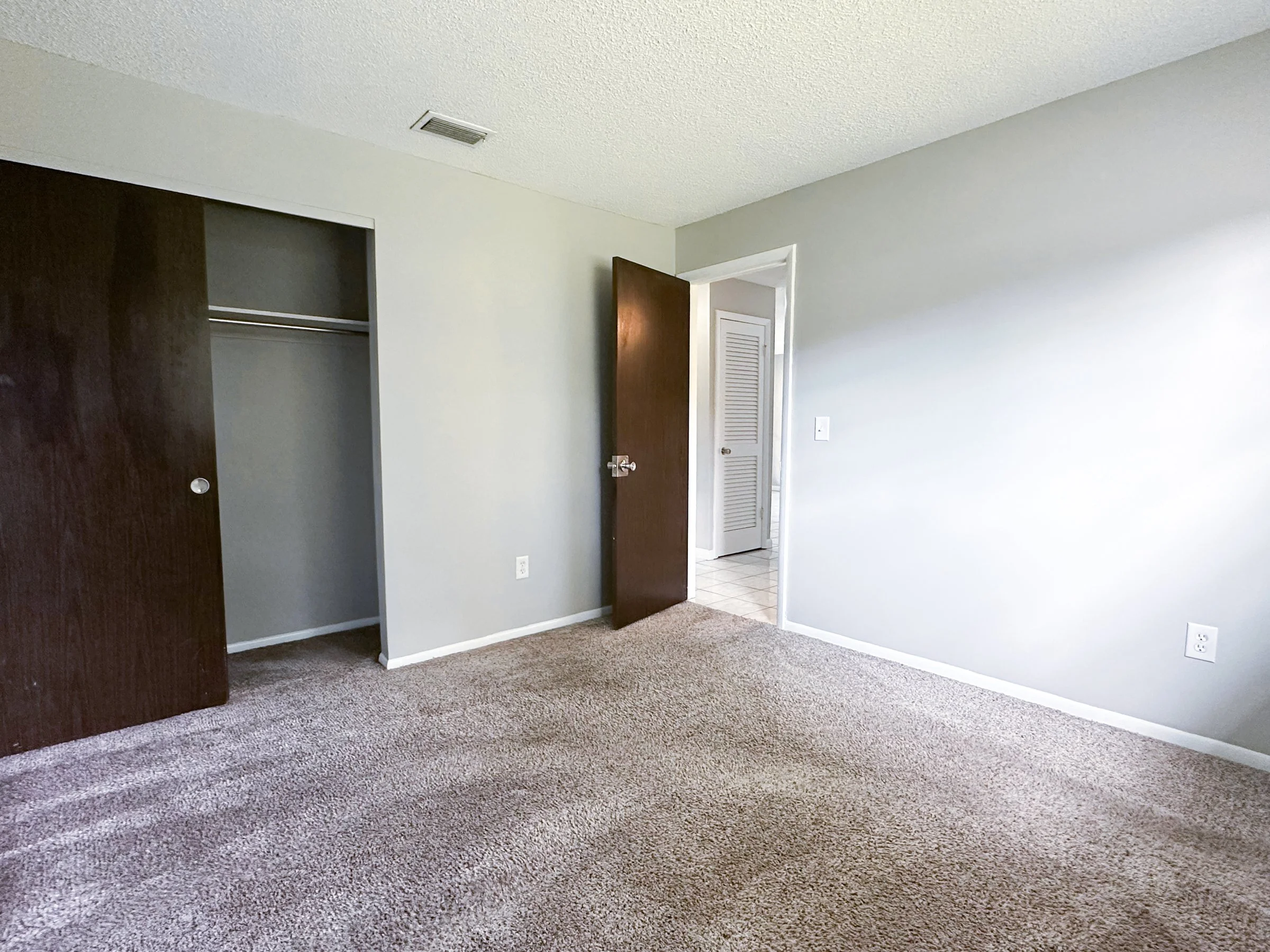 99th Ave _ House Rentals LLC _Bedroom 1.jpg