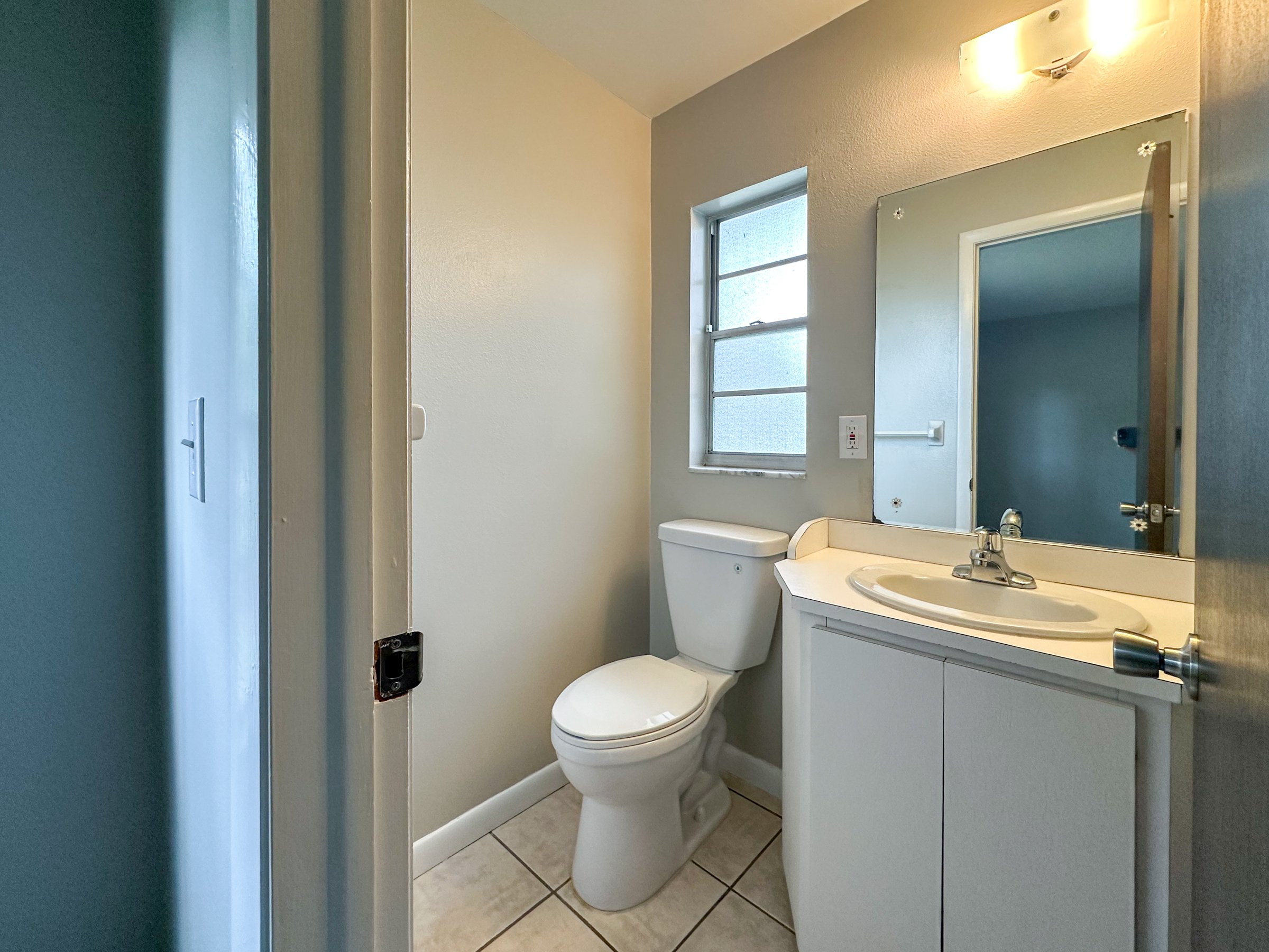 99th Ave _ House Rentals LLC _-Half Bath.jpg