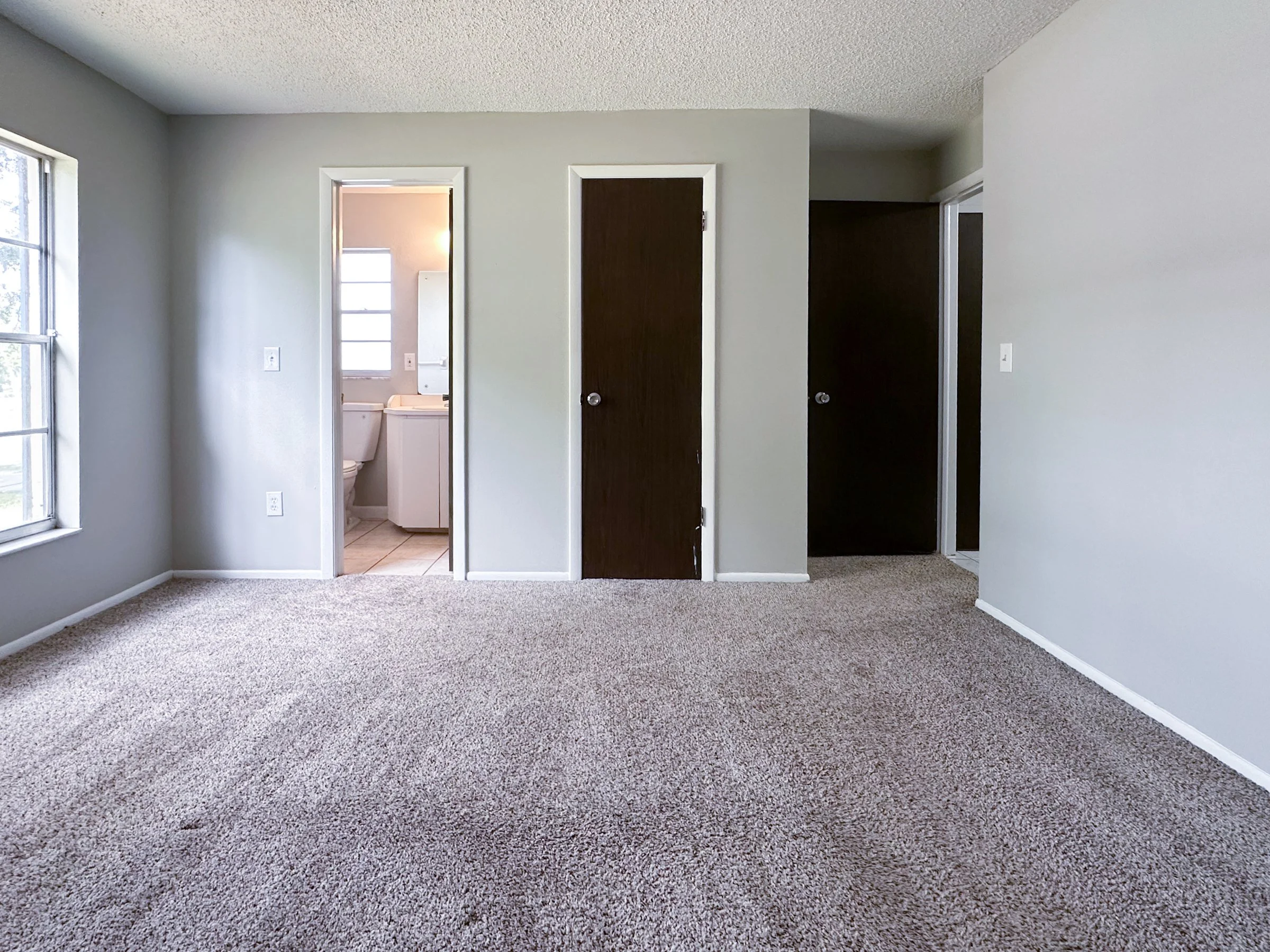 99th Ave _ House Rentals LLC _Master Bedroom.jpg